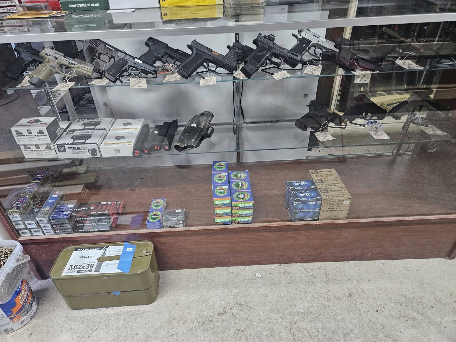 Firearms courses Barnesville GA Handguns and ammunition display for responsible firearm ownership education